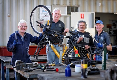 Volunteers change lives a bike at a time